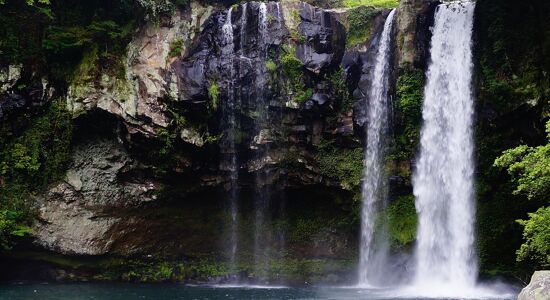 Panoramic view of Phnom Kulen’s waterfalls for a scenic Phnom Kulen Tours banner by Legend Travel Group.